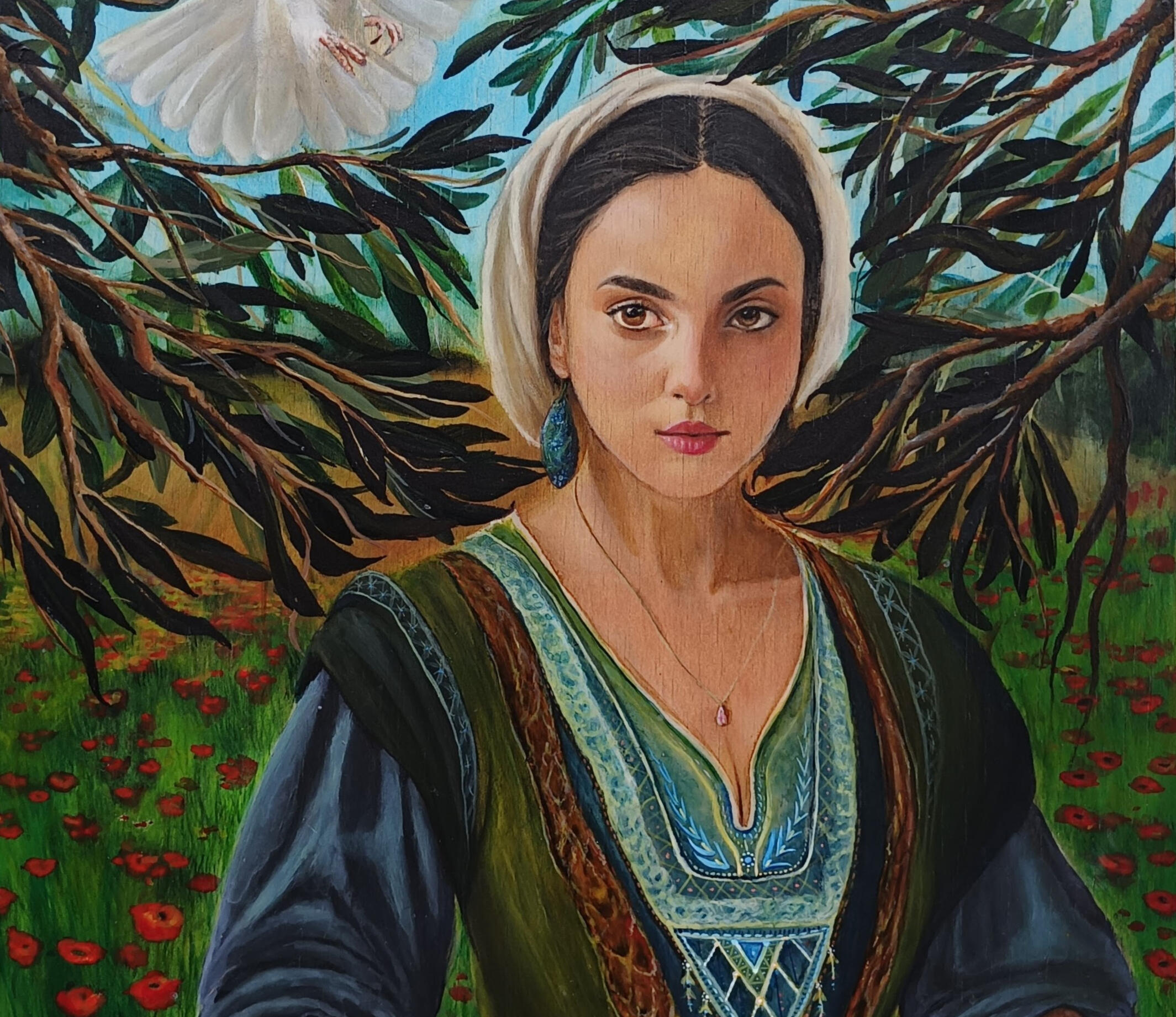 Lady surrounded by olive trees holding a basket of olives